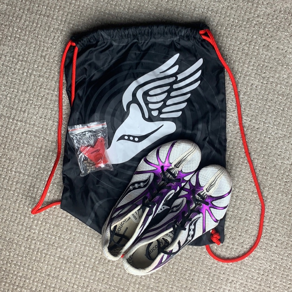 Saucony women’s track spikes with screws and tote